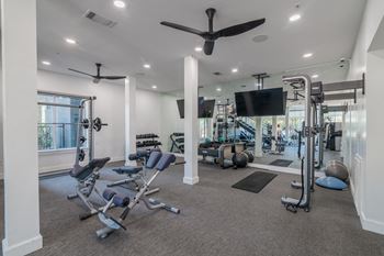 Weight lifting equipment in the fitness center at abstract at design district in dallas tx, 75207